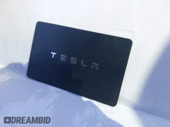 2022 Tesla Model X with VIN 7SAXCAE59NF360301, listed as a IAAI auction lot 41945059 with Not Provided miles and . Bid and sale history available at DreamBid. Image 11.