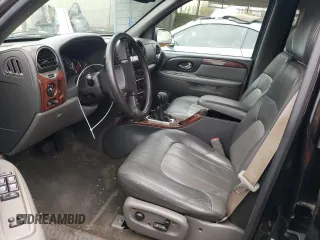 2004 GMC Envoy SLT with VIN 1GKDT13S942279670, listed as a Copart auction lot 73527974 with 120,425 mi miles and Salvage Title. Bid and sale history available at DreamBid. Image 7.