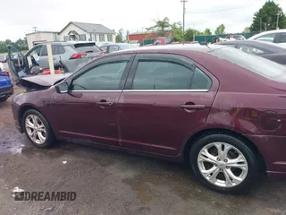2012 Ford Fusion SE z VIN 3FAHP0HA4CR429812, wystawiony jako IAAI lot #42217492 z przebiegiem 207 215 mil mil oraz . Historia ofert i sprzedaży dostępna na DreamBid. Obrazek 14.