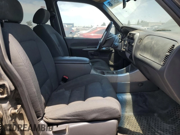 2001 Ford Explorer Sport Trac z VIN 1FMZU77E61UB26259, wystawiony jako Copart lot #62541145 z przebiegiem 258 417 mil mil oraz Czysty tytuł • Clean title. Historia ofert i sprzedaży dostępna na DreamBid. Obrazek 7.