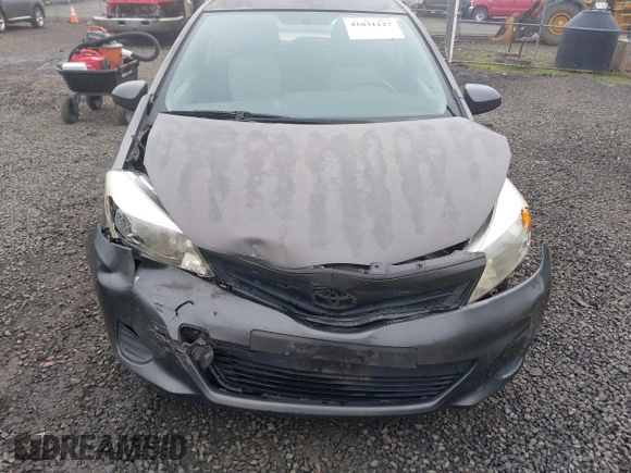 2013 Toyota Yaris L with VIN JTDJTUD39DD560766, listed as a IAAI auction lot 41031127 with 57,831 mi miles. Bid and sale history available at carsss.com. Image 12.