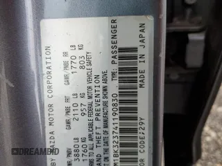 2004 Mazda 3 s with VIN JM1BK323741190830, listed as a Copart auction lot 44629535 with 166,312 mi miles and Salvage Title. Bid and sale history available at DreamBid. Image 12.