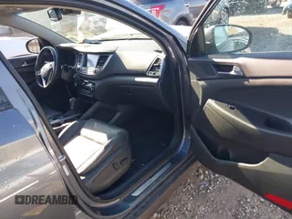 2016 Hyundai Tucson Eco with VIN KM8J3CA2XGU103017, listed as a IAAI auction lot 41897807 with 95,722 mi miles. Bid and sale history available at carsss.com. Image 5.