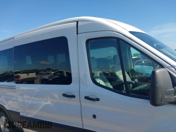 2019 Ford Transit Passenger XL with VIN 1FBAX2CMXKKA94605, listed as a IAAI auction lot 42608464 with 134,305 mi miles and . Bid and sale history available at DreamBid. Image 13.