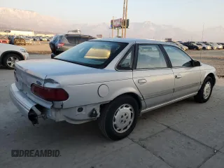 1995 Ford Taurus GL with VIN 1FALP52U5SA320424, listed as a Copart auction lot 83676194 with 177,817 mi miles and Salvage title. Bid and sale history available at DreamBid. Image 3.