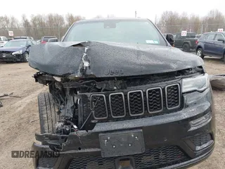 2021 Jeep Grand Cherokee 80th Anniversary with VIN 1C4RJFBG7MC828116, listed as a IAAI auction lot 42118355 with 57,240 mi miles and . Bid and sale history available at DreamBid. Image 13.