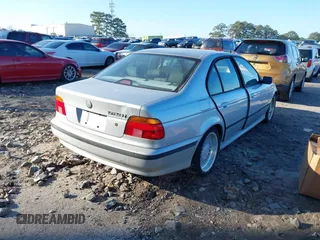 2000 BMW 5 Series 528iA with VIN WBADM6340YGU19599, listed as a IAAI auction lot 41139764 with 233,657 mi miles. Bid and sale history available at carsss.com. Image 4.