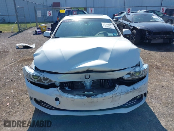 2015 BMW 4 Series 428i xDrive with VIN WBA3N5C52FK484864, listed as a IAAI auction lot 42569077 with 95,431 mi miles and . Bid and sale history available at DreamBid. Image 12.