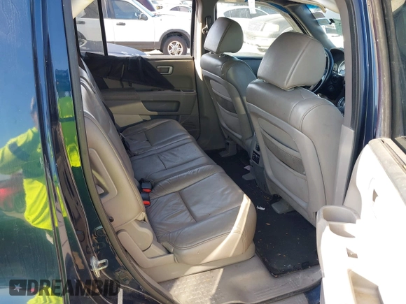 2011 Honda Pilot Touring with VIN 5FNYF4H92BB090056, listed as a IAAI auction lot 42010682 with 201,640 mi miles. Bid and sale history available at carsss.com. Image 8.