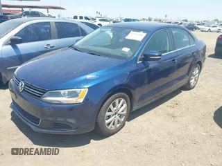 2014 Volkswagen Jetta SE z VIN 3VWD17AJ1EM303577, wystawiony jako IAAI lot #42436160 z przebiegiem 113 086 mil mil oraz . Historia ofert i sprzedaży dostępna na DreamBid. Obrazek 2.