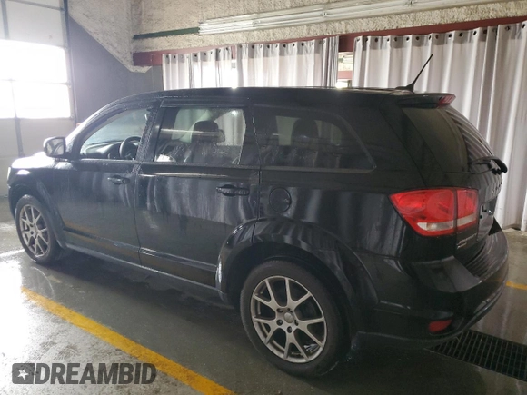 2015 Dodge Journey R/T with VIN 3C4PDDEG7FT749387, listed as a Copart auction lot 52973235 with 127,753 mi miles and Clean Title. Bid and sale history available at DreamBid. Image 2.