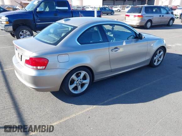 2011 BMW 1 Series 128i with VIN WBAUP7C53BVP21588, listed as a IAAI auction lot 41484300 with 52,124 mi miles. Bid and sale history available at carsss.com. Image 4.