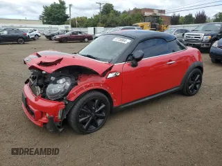 2014 MINI Coupe S z VIN WMWSX3C59ET409176, wystawiony jako Copart lot #72736864 z przebiegiem Nie podano mil oraz Szkody całkowita. Historia ofert i sprzedaży dostępna na DreamBid. Obrazek 1.