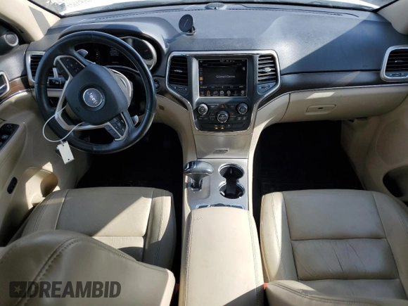 2014 Jeep Grand Cherokee Limited with VIN 1C4RJFBG4EC299273, listed as a Copart auction lot 59660695 with 162,528 mi miles and Salvage title. Bid and sale history available at DreamBid. Image 8.