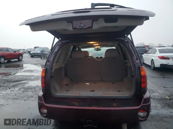 2007 GMC Envoy SLE with VIN 1GKDT13S372265140, listed as a Copart auction lot 84198914 with 256,650 mi miles and Salvage Title. Bid and sale history available at carsss.com. Image 6.