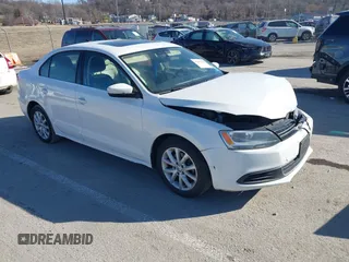 2013 Volkswagen Jetta SE with VIN 3VWDX7AJ8DM424751, listed as a IAAI auction lot 41659290 with 123,408 mi miles and . Bid and sale history available at DreamBid. Image 1.