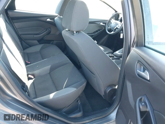 2013 Ford Focus SE z VIN 1FADP3F28DL206541, wystawiony jako IAAI lot #41639697 z przebiegiem 109 828 mil mil oraz . Historia ofert i sprzedaży dostępna na DreamBid. Obrazek 8.