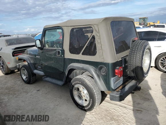 2003 Jeep Wrangler Sport with VIN 1J4FA49S43P301542, listed as a Copart auction lot 75704824 with Not Provided miles and Salvage Title. Bid and sale history available at carsss.com. Image 2.