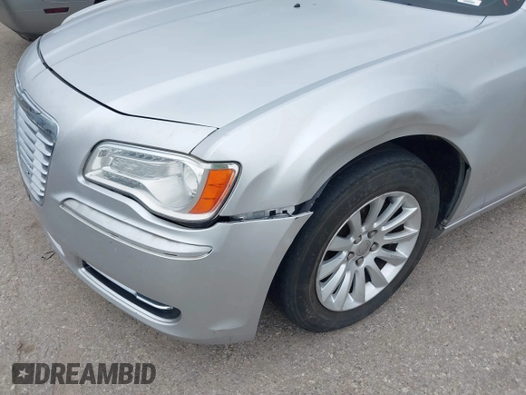2012 Chrysler 300 z VIN 2C3CCAAG4CH117834, wystawiony jako IAAI lot #42429428 z przebiegiem 226 738 mil mil oraz . Historia ofert i sprzedaży dostępna na DreamBid. Obrazek 13.