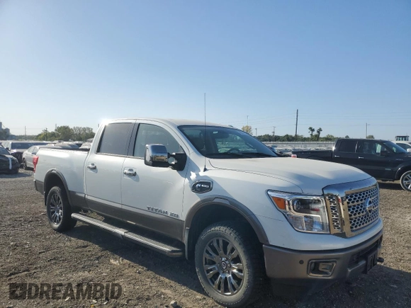 2017 Nissan Titan XD PRO-4X with VIN 1N6BA1F44HN541022, listed as a Copart auction lot 73966134 with 66,582 mi miles and Salvage Title. Bid and sale history available at carsss.com. Image 4.