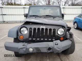 2010 Jeep Wrangler Sport with VIN 1J4AA2D15AL208420, listed as a Copart auction lot 50907635 with 133,840 mi miles and Salvage Title. Bid and sale history available at carsss.com. Image 5.