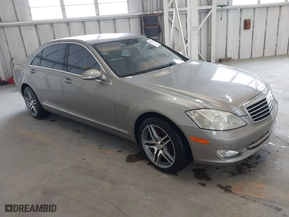 2007 Mercedes-Benz S-Class 5.5L V8 with VIN WDDNG71X07A081212, listed as a IAAI auction lot 41971565 with 166,904 mi miles. Bid and sale history available at carsss.com. Image 1.