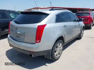 2015 Cadillac SRX Luxury Collection z VIN 3GYFNBE35FS627640, wystawiony jako IAAI lot #42262843 z przebiegiem 211 669 mil mil oraz . Historia ofert i sprzedaży dostępna na DreamBid. Obrazek 4.