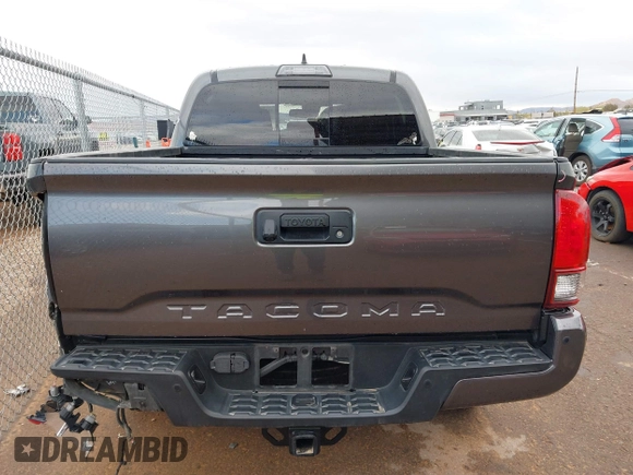 2018 Toyota Tacoma SR5 with VIN 3TMAZ5CN0JM061233, listed as a IAAI auction lot 41944668 with 94,314 mi miles and . Bid and sale history available at DreamBid. Image 16.
