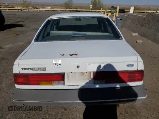 1986 Ford Tempo z VIN 1FABP22X4GK263512, wystawiony jako Copart lot #50618855 z przebiegiem 392 265 mil mil oraz Tytuł czysty. Historia ofert i sprzedaży dostępna na DreamBid. Obrazek 6.