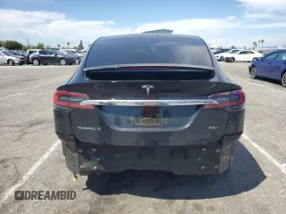 2017 Tesla Model X 90D with VIN 5YJXCBE20HF051099, listed as a Copart auction lot 52208205 with 118,828 mi miles and Salvage Title. Bid and sale history available at DreamBid. Image 6.