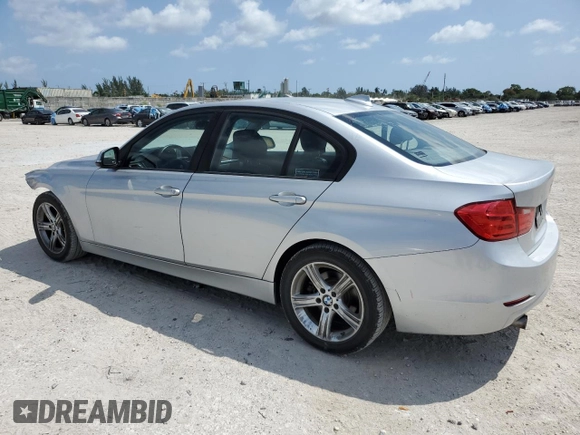 2015 BMW 3 Series 320i with VIN WBA3B1G51FNT64659, listed as a Copart auction lot 51007935 with 99,495 mi miles and Salvage Title. Bid and sale history available at carsss.com. Image 2.
