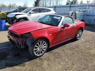 2017 FIAT 124 Spider Lusso z VIN JC1NFAEKXH0106484, wystawiony jako Copart lot #55729775 z przebiegiem 104 341 mil mil oraz Tytuł czysty. Historia ofert i sprzedaży dostępna na DreamBid. Obrazek 1.
