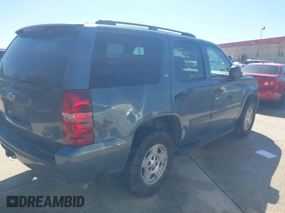 2008 Chevrolet Tahoe LS with VIN 1GNFC13C48J230358, listed as a IAAI auction lot 42219111 with 257,851 mi miles and . Bid and sale history available at DreamBid. Image 4.