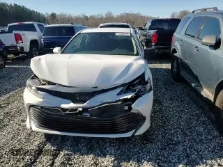 2019 Toyota Camry LE with VIN 4T1B11HK0KU719418, listed as a Copart auction lot 41380975 with 56,937 mi miles and Salvage Title. Bid and sale history available at carsss.com. Image 10.
