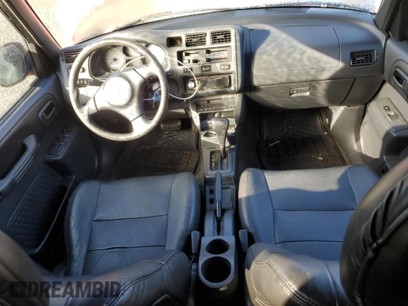 1999 Toyota RAV4 with VIN JT3GP10VXX0038569, listed as a Copart auction lot 45241935 with 311,042 mi miles and Clean Title. Bid and sale history available at DreamBid. Image 8.
