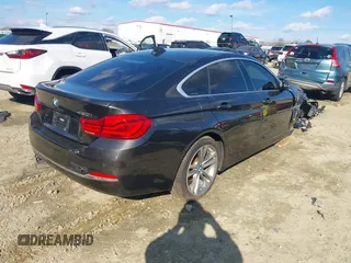 2018 BMW 4 Series 430i xDrive with VIN WBA4J3C54JBG95242, listed as a IAAI auction lot 41180565 with 83,710 mi miles and . Bid and sale history available at DreamBid. Image 4.