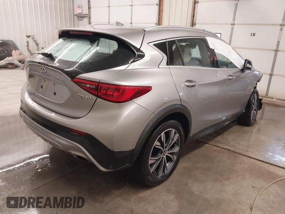 2017 Infiniti QX30 Luxury with VIN SJKCH5CR6HA038610, listed as a IAAI auction lot 41379870 with 90,402 mi miles. Bid and sale history available at carsss.com. Image 4.