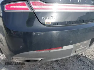 2016 Lincoln MKZ with VIN 3LN6L2G93GR624043, listed as a IAAI auction lot 41446081 with 124,680 mi miles and . Bid and sale history available at DreamBid. Image 14.