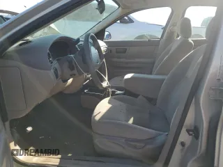 2006 Ford Taurus SE с VIN 1FAFP53U76A221489, выставлен на аукционе Copart как лот 72615374 с пробегом Не указан миль и Списание • Salvage title. История ставок и продаж доступна на DreamBid. Изображение 7.