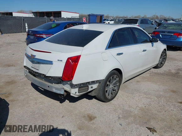 2016 Cadillac CTS with VIN 1G6AR5SS1G0112728, listed as a IAAI auction lot 41830547 with 100,610 mi miles and . Bid and sale history available at DreamBid. Image 4.
