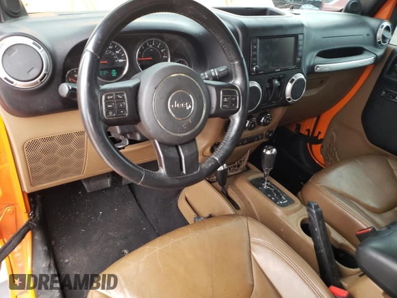 2013 Jeep Wrangler Sahara с VIN 1C4AJWBG4DL557688, выставлен на аукционе Copart как лот 57789095 с пробегом 104 461 миль миль и Списание • Salvage title. История ставок и продаж доступна на DreamBid. Изображение 8.