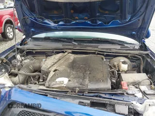2015 Toyota Tacoma with VIN 3TMLU4EN1FM186747, listed as a IAAI auction lot 42493658 with 104,100 mi miles and . Bid and sale history available at DreamBid. Image 10.