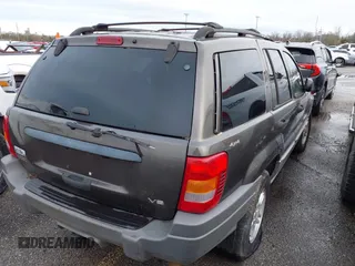 2000 Jeep Grand Cherokee Laredo with VIN 1J4GW48N2YC187623, listed as a IAAI auction lot 41311495 with 121,831 mi miles and . Bid and sale history available at DreamBid. Image 4.