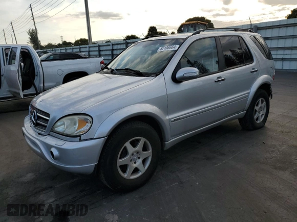 2002 Mercedes-Benz M-Class with VIN 4JGAB75EX2A326747, listed as a Copart auction lot 82106664 with 264,245 mi miles and Salvage Title. Bid and sale history available at carsss.com. Image 1.