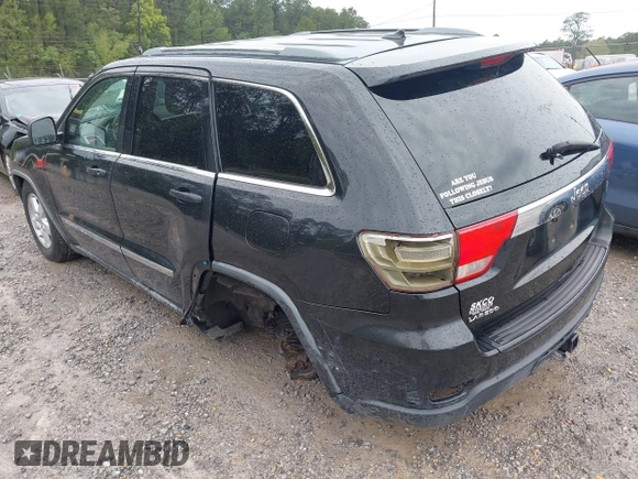 2011 Jeep Grand Cherokee Laredo with VIN 1J4RS4GG7BC569287, listed as a IAAI auction lot 41915092 with 211,148 mi miles and . Bid and sale history available at DreamBid. Image 3.