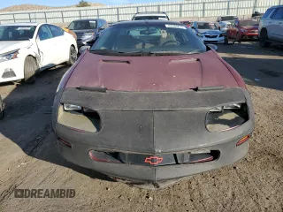 1994 Chevrolet Camaro z VIN 2G1FP22S4R2112885, wystawiony jako Copart lot #83088874 z przebiegiem 120 416 mil mil oraz Czysty tytuł • Clean title. Historia ofert i sprzedaży dostępna na DreamBid. Obrazek 5.