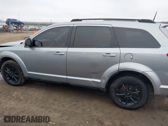 2019 Dodge Journey SE with VIN 3C4PDCBG9KT869149, listed as a IAAI auction lot 41472289 with 97,333 mi miles and . Bid and sale history available at DreamBid. Image 15.