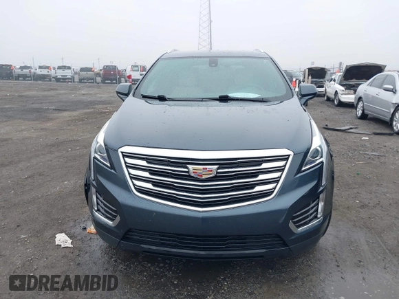 2019 Cadillac XT5 FWD with VIN 1GYKNARS5KZ220134, listed as a IAAI auction lot 41472927 with 58,229 mi miles and . Bid and sale history available at DreamBid. Image 12.