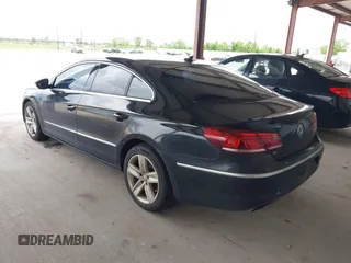 2013 Volkswagen CC Sport with VIN WVWBP7AN1DE506856, listed as a IAAI auction lot 42111392 with 172,706 mi miles. Bid and sale history available at carsss.com. Image 3.