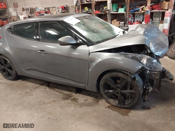 2016 Hyundai Veloster with VIN KMHTC6AD8GU267426, listed as a IAAI auction lot 41349385 with 114,245 mi miles. Bid and sale history available at carsss.com. Image 1.